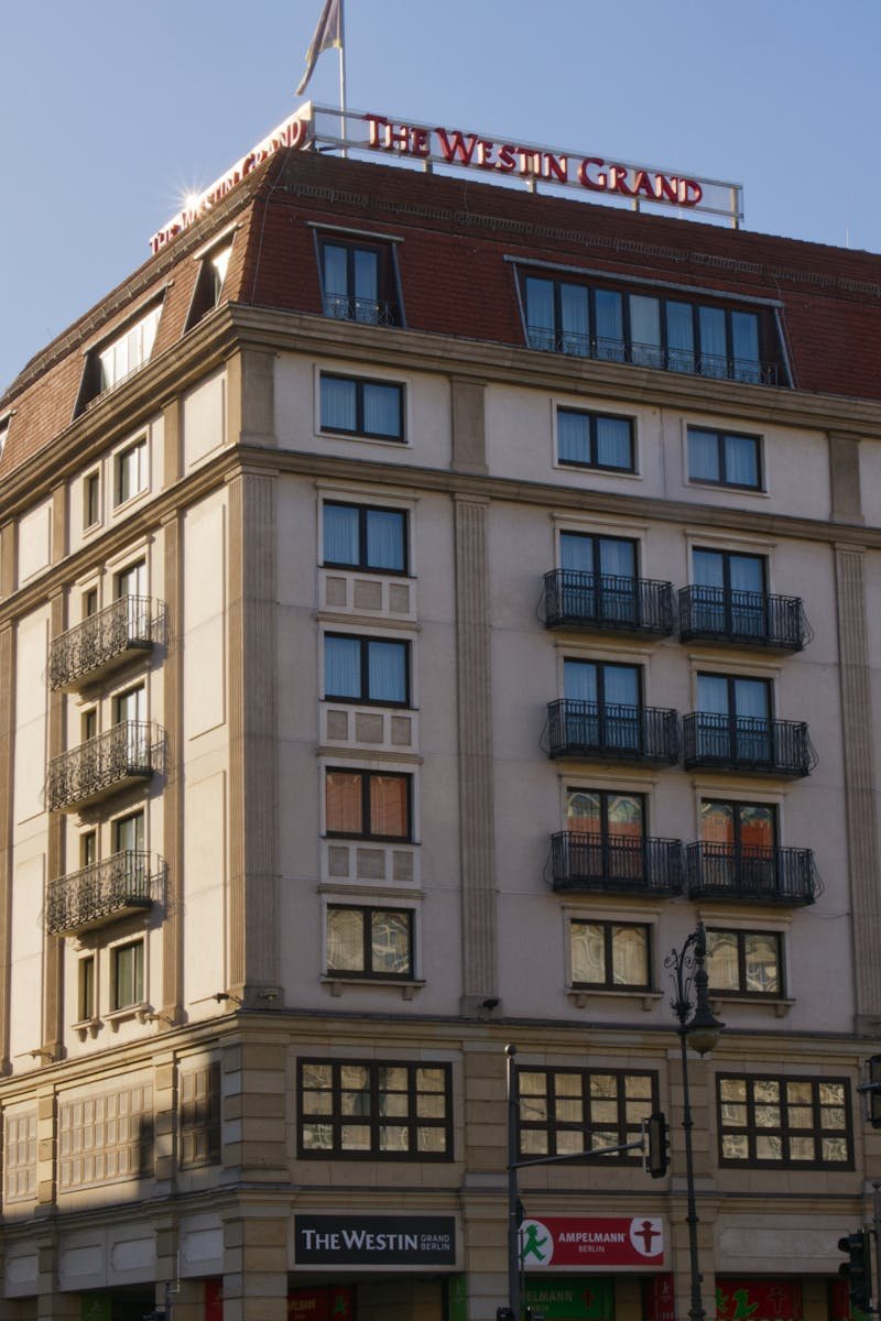 The Westin Grand Hotel facade with a modern architectural design under daylight.