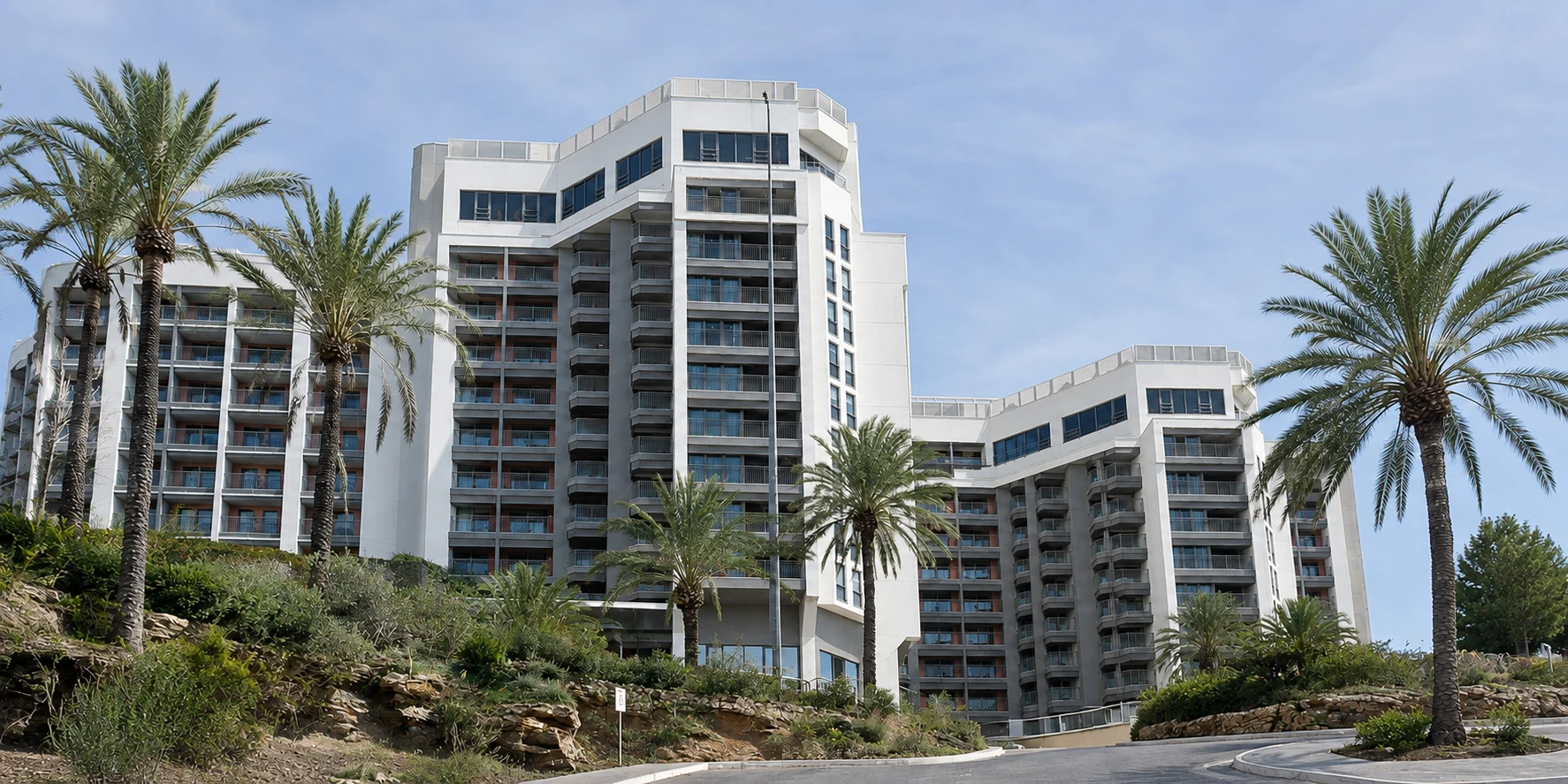 Coastal hotel exterior — illustrative hospitality setting